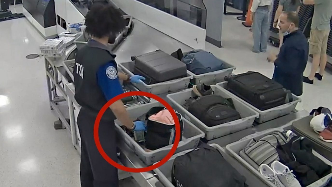 US CCTV shows airport staff allegedly stealing from bags
